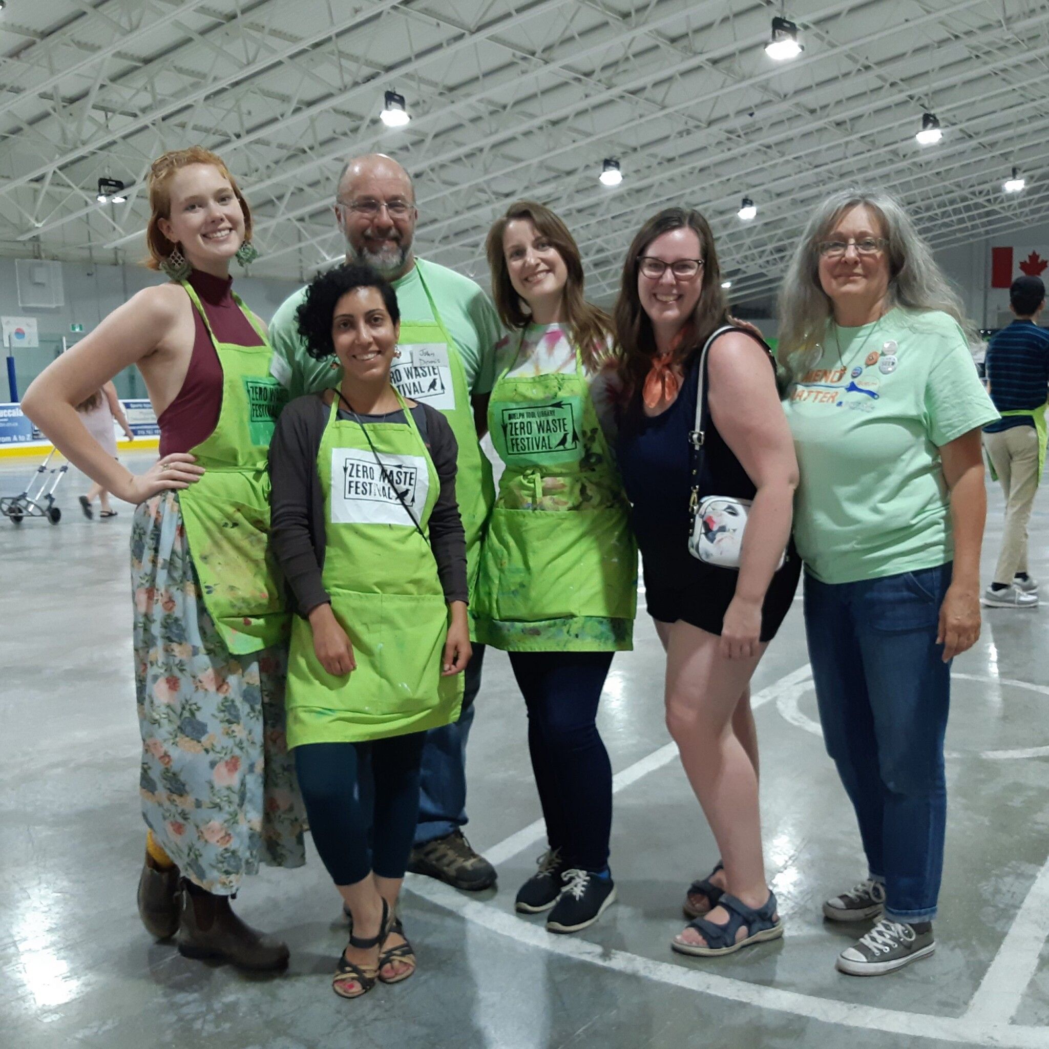 Volunteer Coordinators on a convention centre floor.